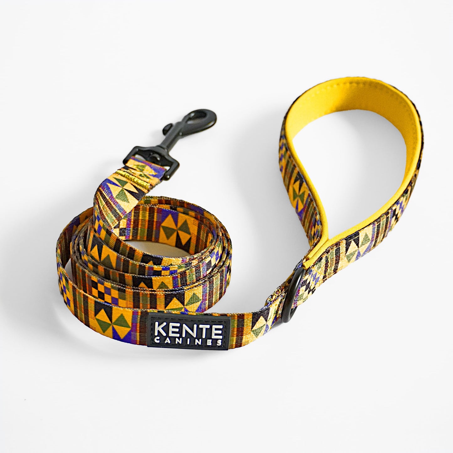 Kente Canines Gold Rush yellow leash with Kente pattern on a white background